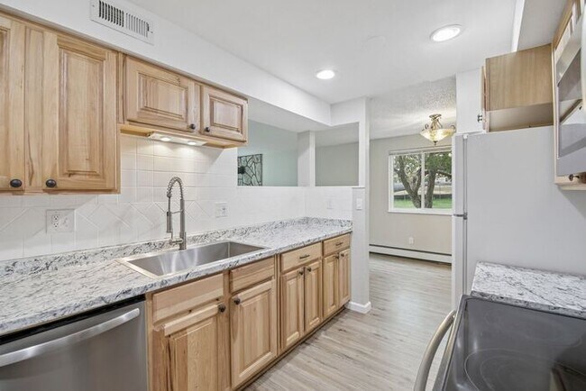 Building Photo - Townhome-Style Living with Greenbelt Views, Attached Garage & Community Pool!
