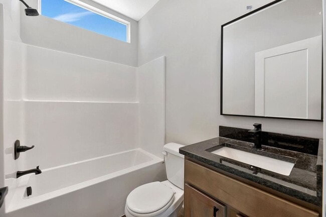 Building Photo - Modern 3-Bed Ranch in Maize – Zero-Entry L...
