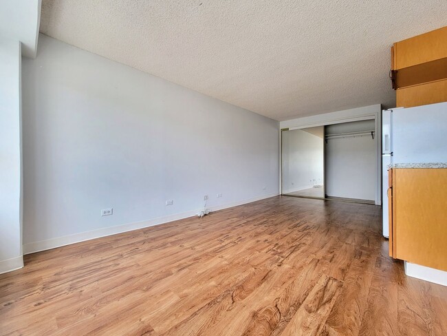 Building Photo - For Rent | Full Size Studio Apartment with...