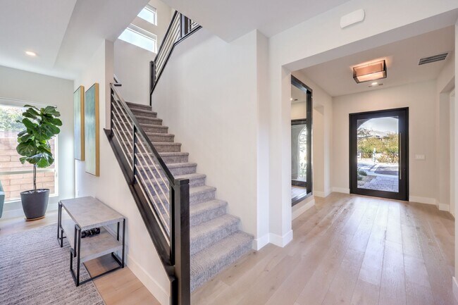 Building Photo - Exquisite 6-bed/ 6-bath residence nestled within the prestigious, guard-gated community of Revere...