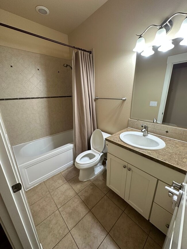 Building Photo - Vaulted Ceilings & Loft – Charming 3 Bedroom Home