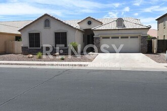 Building Photo - 3 Bedroom + Den Home with Pool & Putting Green – Pool Service Included!