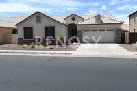 Building Photo - 3 Bedroom + Den Home with Pool & Putting Green – Pool Service Included!