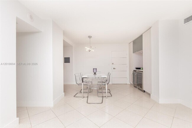 Building Photo - 5555 Collins Ave