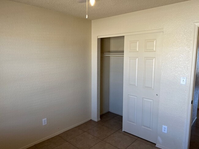 Building Photo - Four Bedroom Mountain View Home with large fenced back yard and double gates