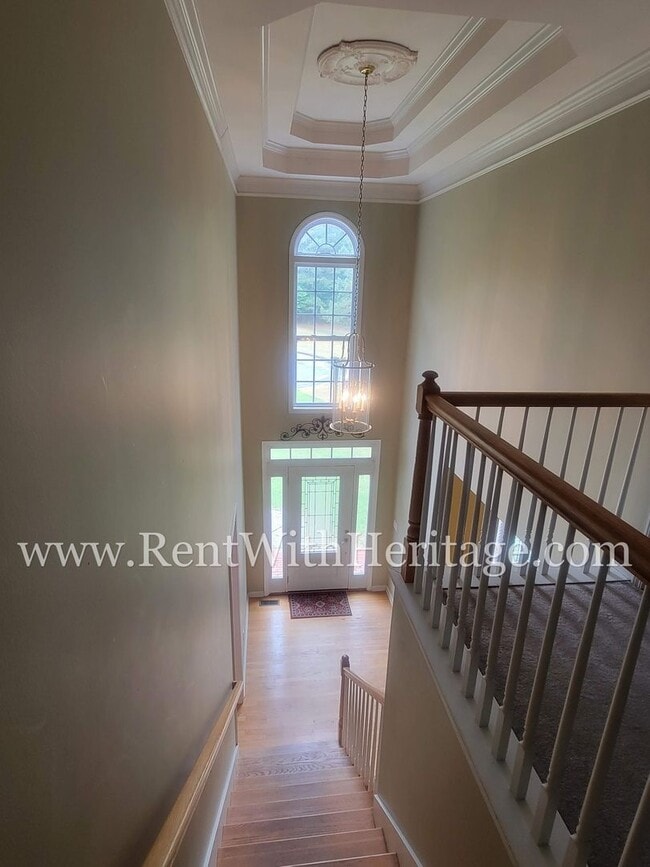 Building Photo - Gorgeous 3-Story Brick Home / 2 Fireplaces / Full Finished Basement / Chapel Hill Schools