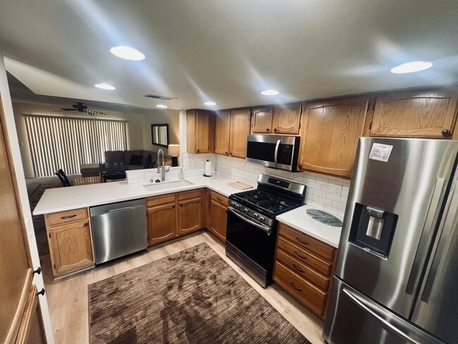 Building Photo - Affordable Comfort in 55+ Guard-Gated Comm...
