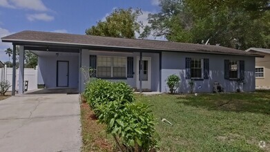 Building Photo - Charming 3-Bedroom Home with Sunroom and S...
