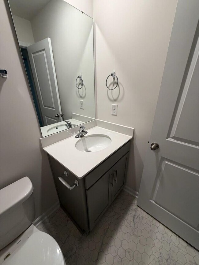 Building Photo - Brand new 3 bedroom townhome available for immediate move in!