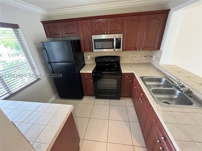 Building Photo - 8560 N Sherman Cir