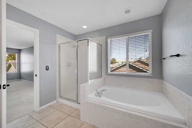 Building Photo - $2,540.95, 4 bed, 3.5 bath Home in Co Springs with Fenced in Yard and Finished Basement!