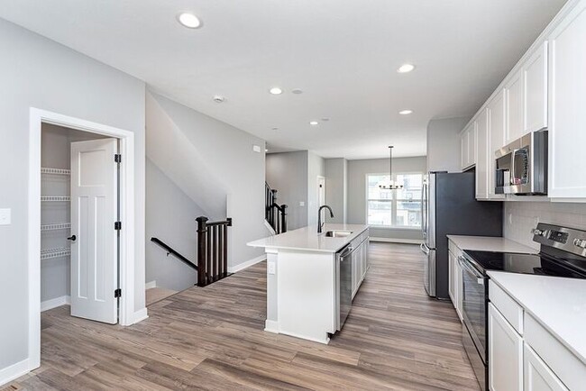 Building Photo - Brand New 3 Bed Townhome in Booming Westfi...