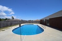 Building Photo - Spacious 4-Bedroom Home with Pool Care Inc...
