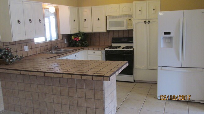 Building Photo - INQUIRE - OPEN HOUSE COMING SOON:   LARGE 4BR/2BA HOUSE, TILE, REMODELED, GREAT LOCATION, NEAR MC...