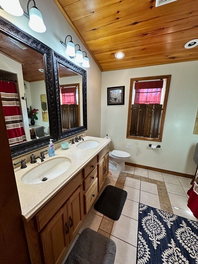 Building Photo - 5 Bedroom 2 1/2 Bath Home w/ Wrap Around P...