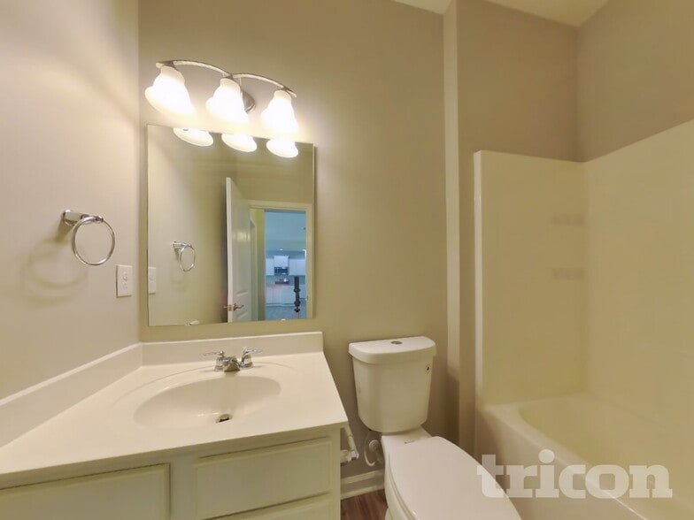 Building Photo - 6909 Barefoot Forest Dr