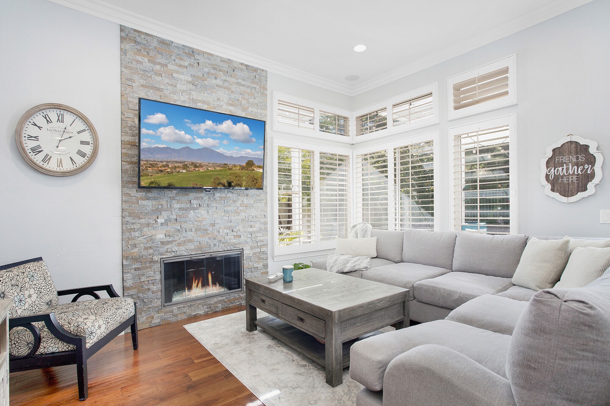 family room shutters, stacked stone firepalce and TV ready mount - 35 Inverary