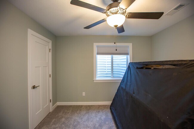 Building Photo - Stunning 4 Bed, 3 Bath Home | 3-Car Garage | Scenic Meadows