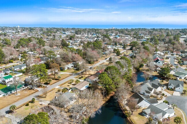 Building Photo - 4 Bed/2 Bath Furnished Single Family Home in Surfside 1 Mile to the Beach By Golf Cart!