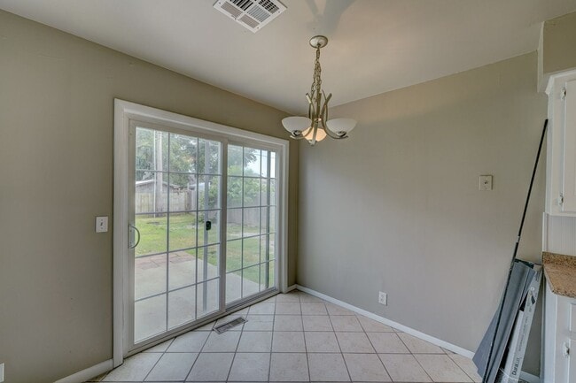 Building Photo - Updated 3-Bedroom Home with Spacious Backy...