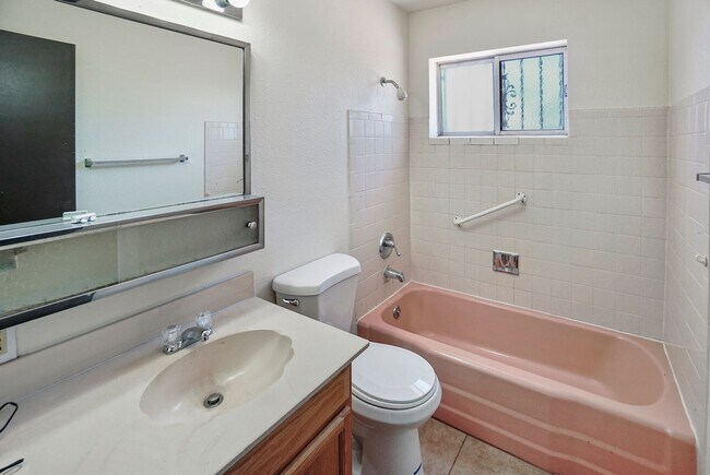 Building Photo - Eastside home- 4 bedroom/ 2 bathrooms, pool and large backyard