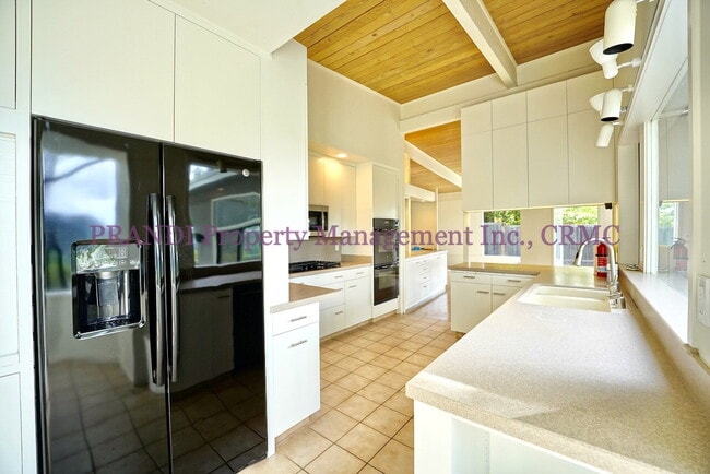 Building Photo - "Spacious 4-Bedroom Oasis with 3 Full Baths in Beautiful Kent Woodlands"