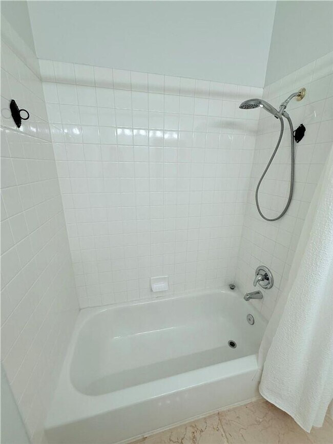 Building Photo - Amazing condominium in gated upscale neigh...
