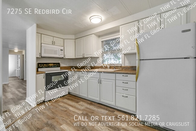 Building Photo - 7275 SE Redbird Cir