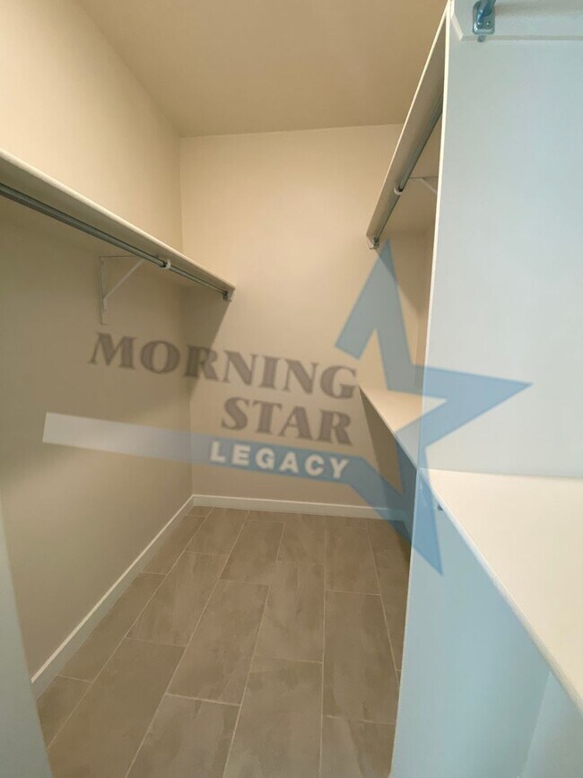 Building Photo - NEW CONSTRUCTION AND FULLY LOADED