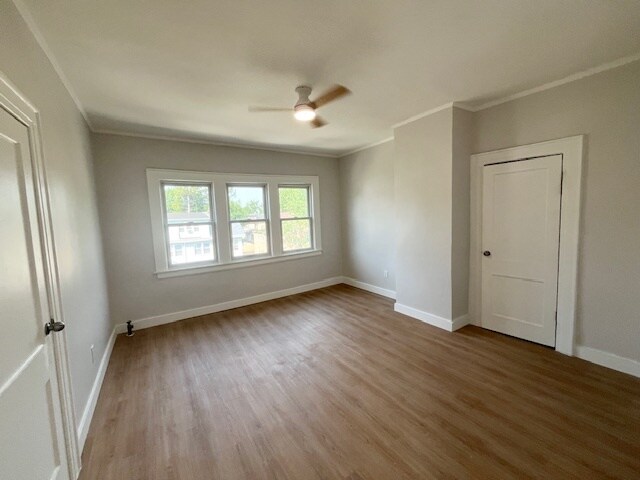 large bedroom with 2 walk in closets and 12000 BTU Cool and heat unit - 104 Goldsmith Ave