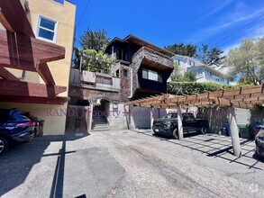 Building Photo - Split Level Condo Just Steps from Downtown