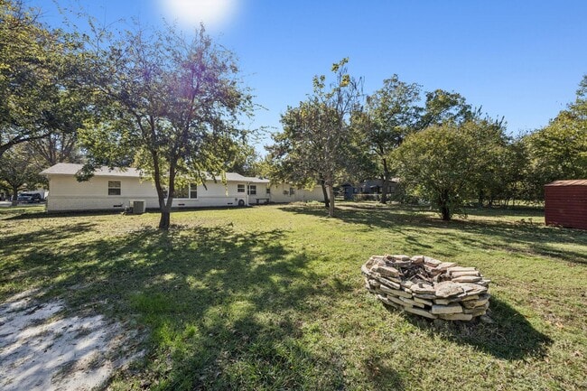 Building Photo - Stylish Renovation + Solar Savings in Prime Location