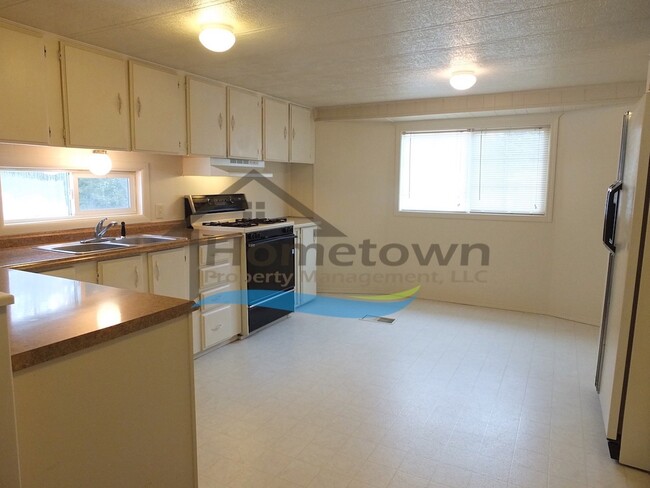 Building Photo - Spacious 2 Bedroom Home with Wood Stove in...