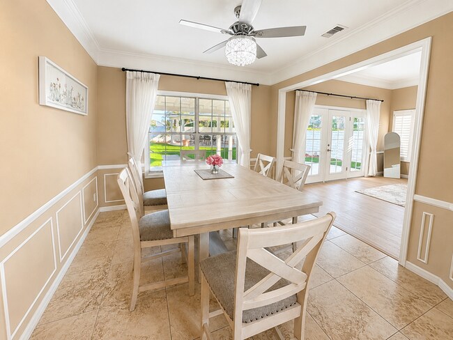 Building Photo - Furnished 4BR + Office | Putting Green Yard