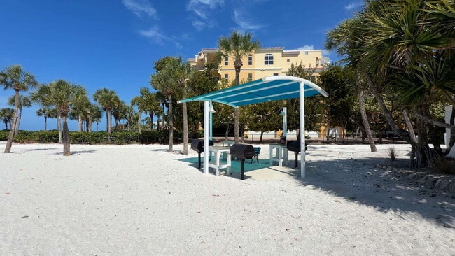 Building Photo - Luxury Furnished Longboat Key Retreat with Private Beach Club Access & Golf Course Views Remodele...