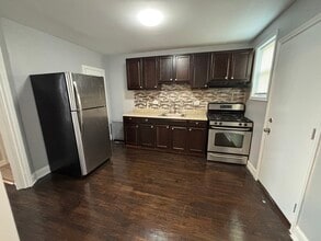 Building Photo - 4 Bedrooms 2 Bathrooms, 21239
