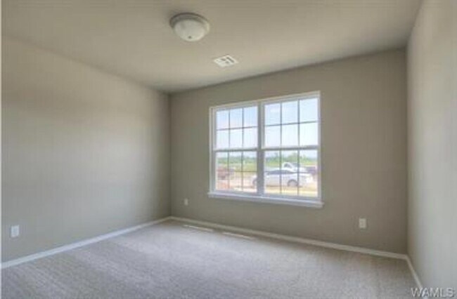 Building Photo - Stylish 4BR/2BA Home with Garage & Privacy...