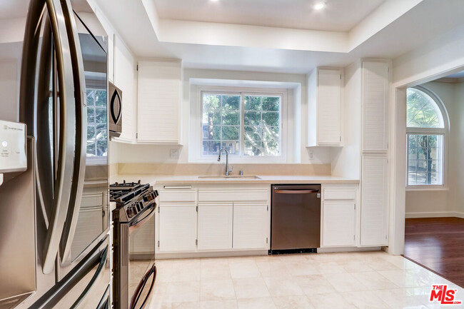 Building Photo - 8505 Gulana Ave