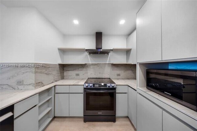Building Photo - 7901 Hispanola Ave
