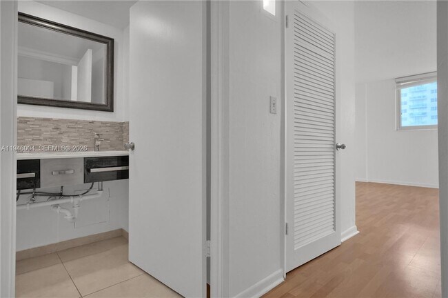 Building Photo - 19380 Collins Ave