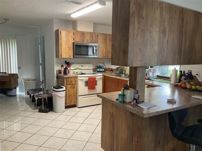 Building Photo - 6269 Woodbury Rd