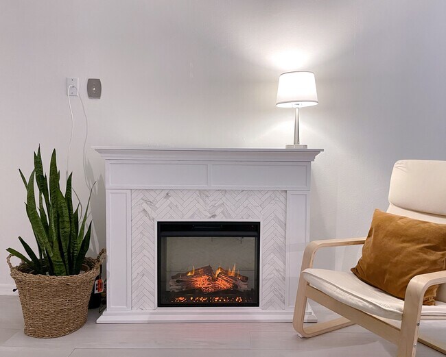 Beautiful fire place, it comes with the condo. - 7718 Royal Ln