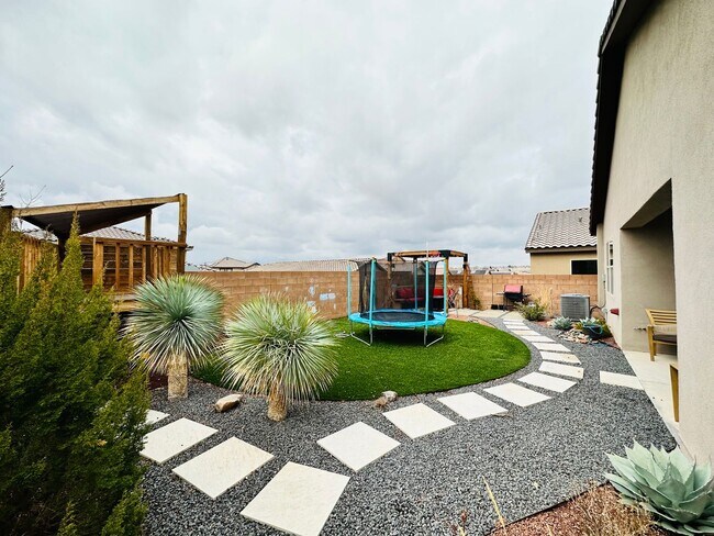 Building Photo - STUNNING Back yard!  Level II EV Charger!