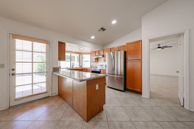 Building Photo - Welcome to this stunning 4-bedroom, 2-bath...