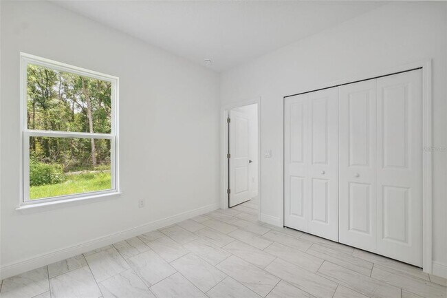 Building Photo - 10089 N Athenia Dr