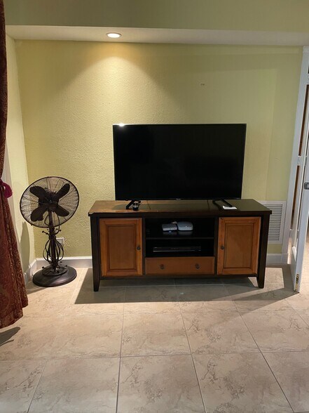 Living Room TV - 5005 Collins Ave