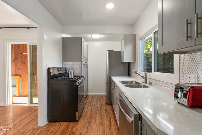 Kitchen view from balcony exit - 504 Pacific Ave