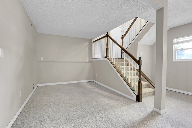 Building Photo - $2,720.95 - 4 bed, 2 bath, located in Aurora with attached Garage and In Unit Washer and Dryer!