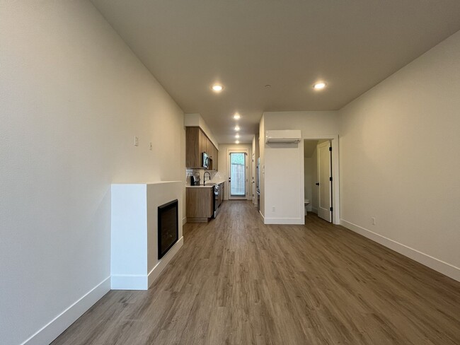 Building Photo - Modern 2-Bed, 1.5-Bath Condo with Custom Kitchen, Private Patio, and Prime Location