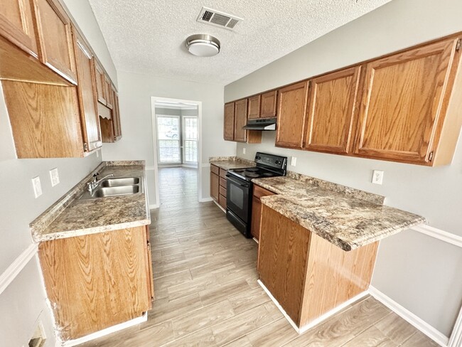 Building Photo - 8415 Woolrich Dr